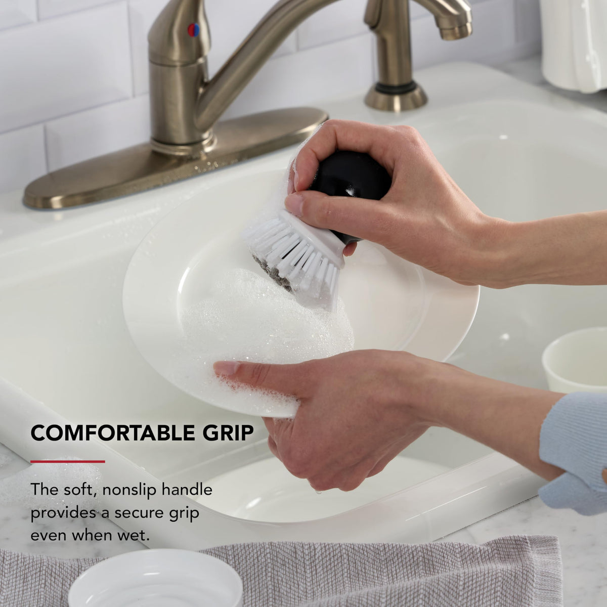 KitchenAid palm brush is dishwasher safe for quick cleanup.