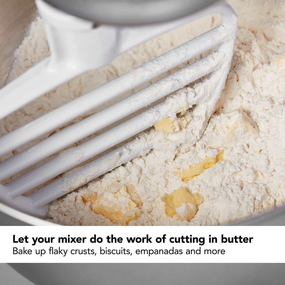 KitchenAid Pastry Beater KSMPB5 mashing fruits and vegetables for smooth textures.