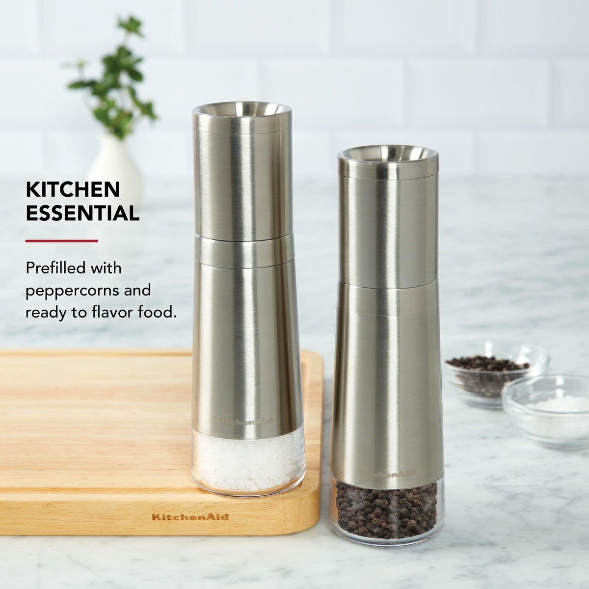 Clear base of KitchenAid pepper grinder shows remaining peppercorns at a glance.
