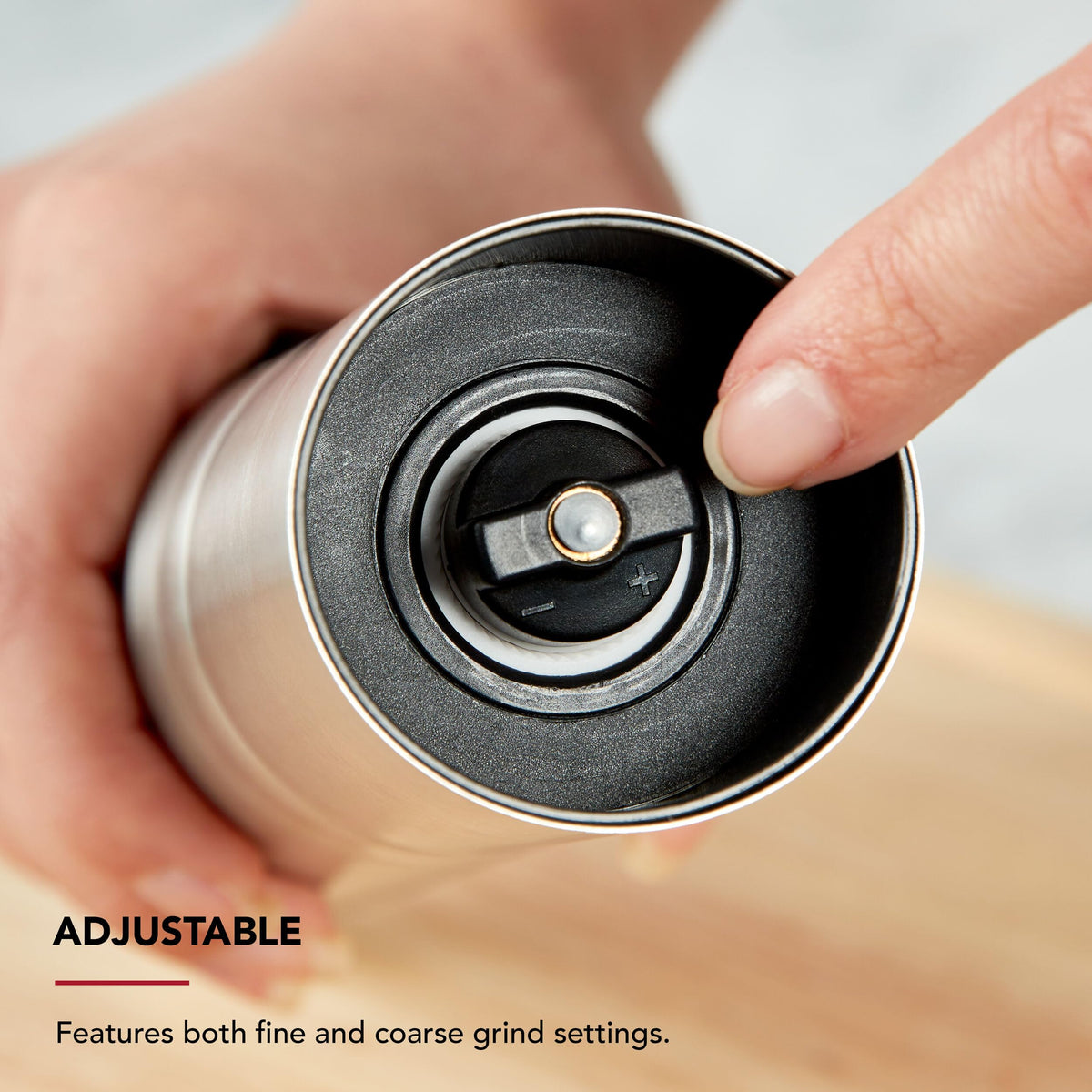 Durable stainless-steel body of the KitchenAid pepper grinder.