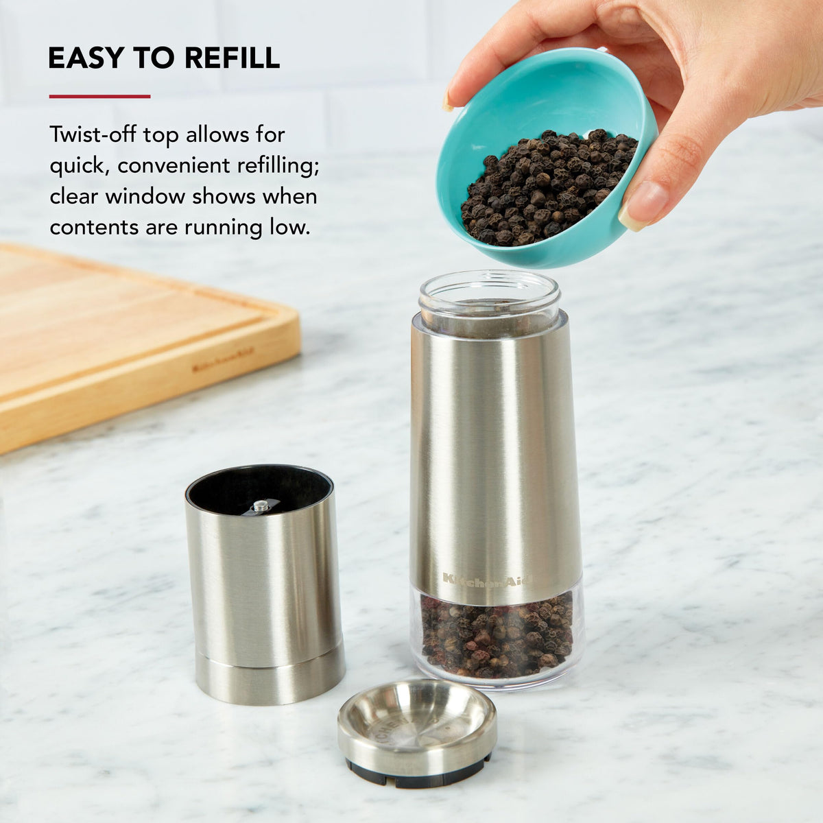 Twist-off top design enables mess-free refills on KitchenAid pepper grinder.