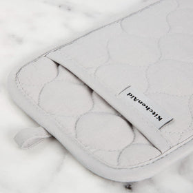 KitchenAid Pot Holder closeup highlights reinforced quilting for durability.