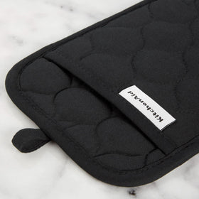 KitchenAid pot holder shows dual-layer construction for steady pan handling.