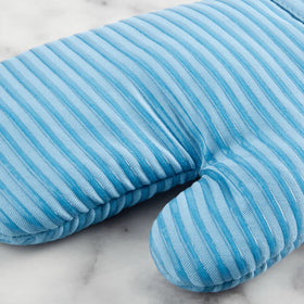 Close look at KitchenAid pot holder blue velvet texture and grip.