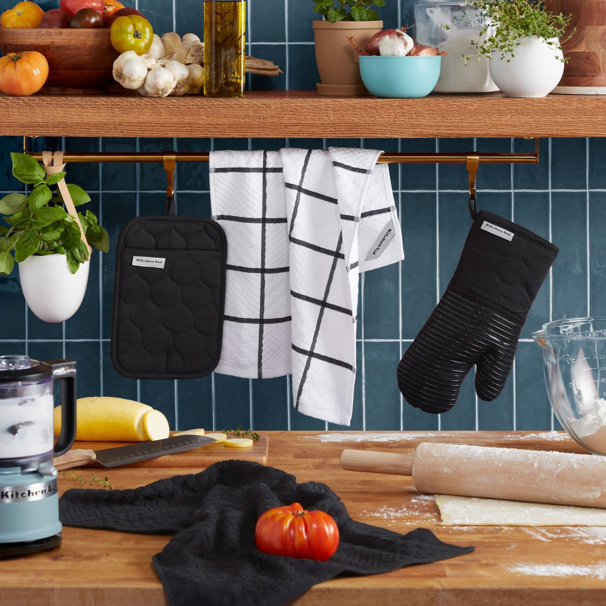 KitchenAid quilted pot holder close-up highlights non-slip silicone grip.