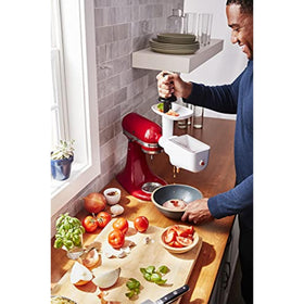 KitchenAid removable tray catches dried skins and peels for easy cleanup.
