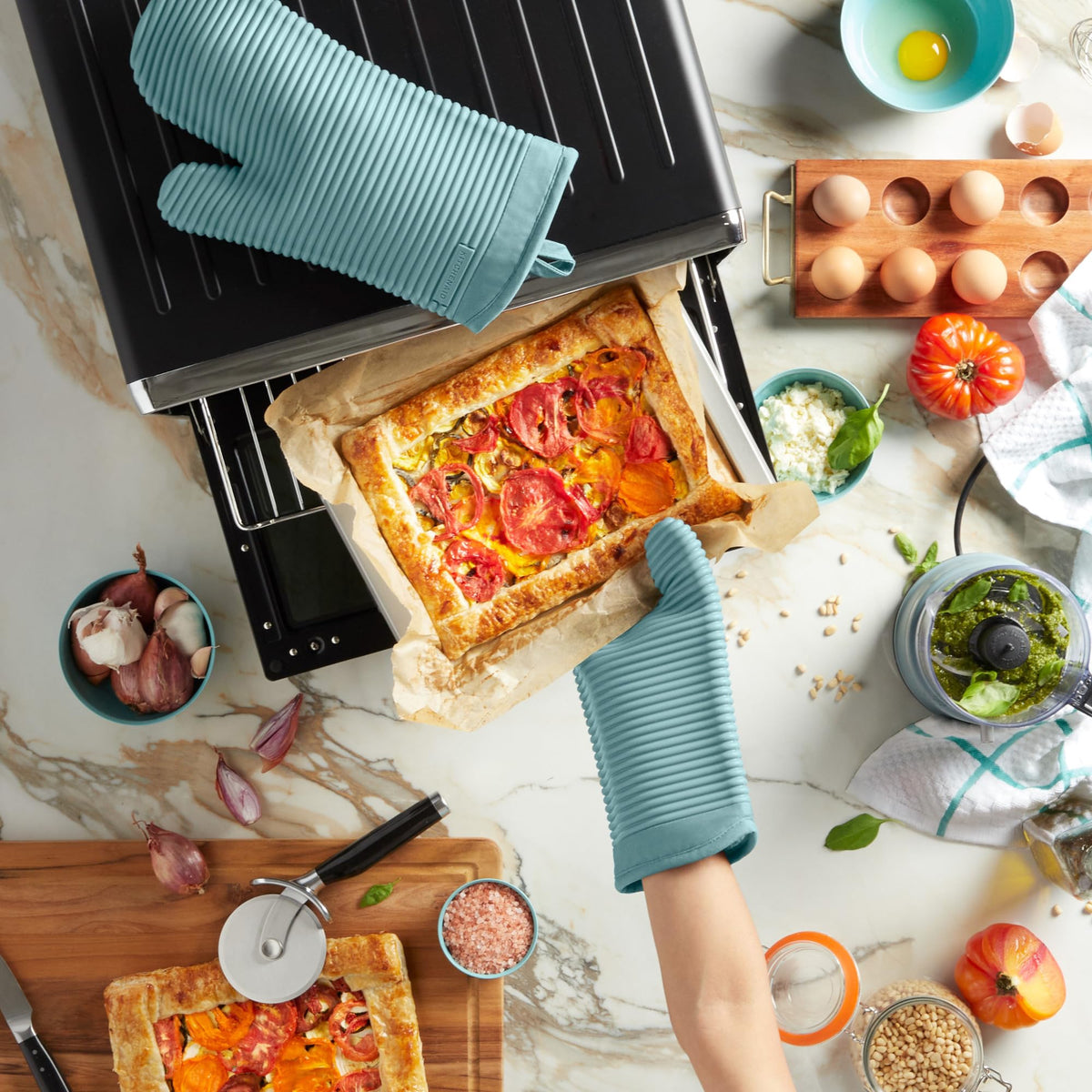 KitchenAid ribbed silicone oven mitts resist heat up to 500°F for safer handling