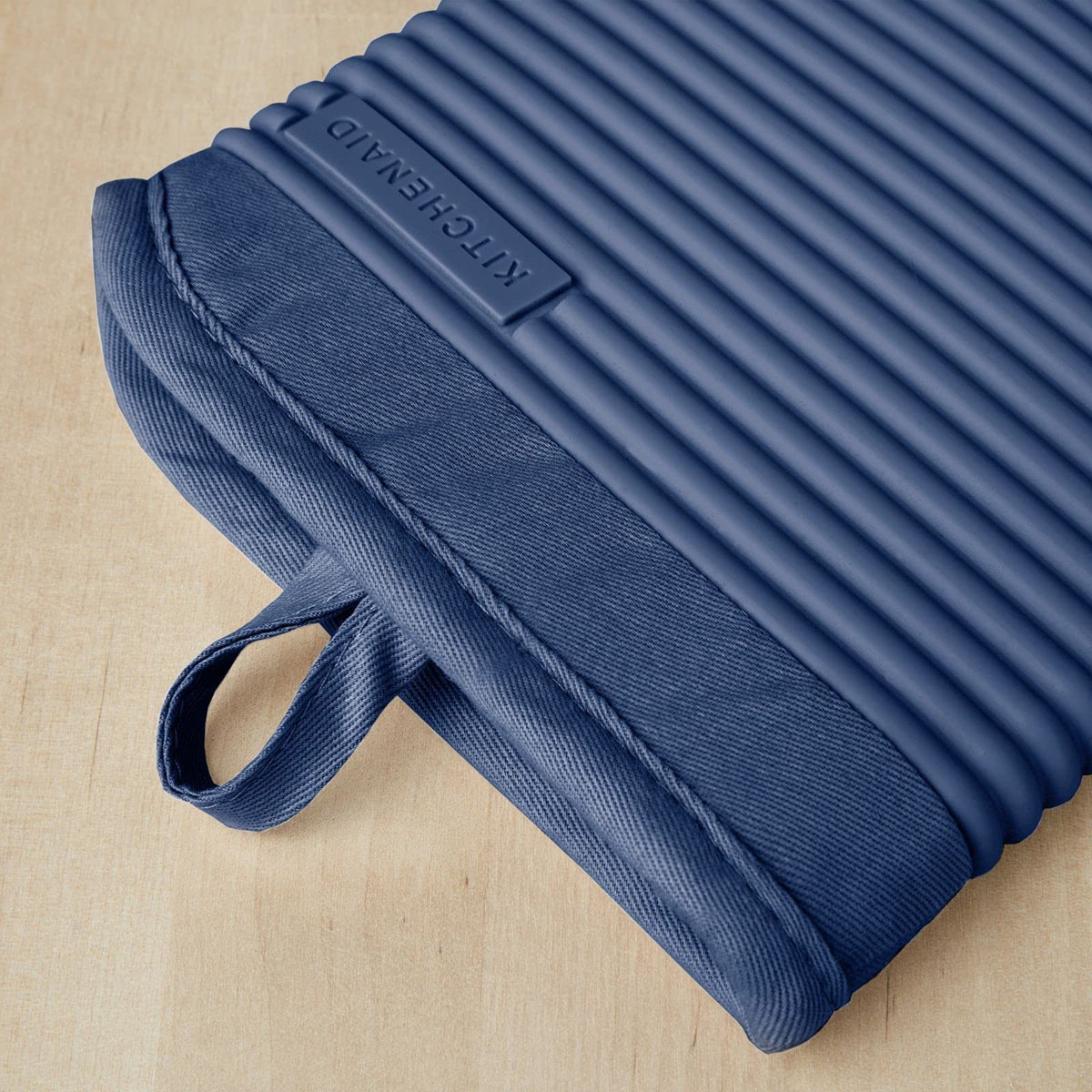 KitchenAid cuff-detail mitt with cotton cuff for extra protection.