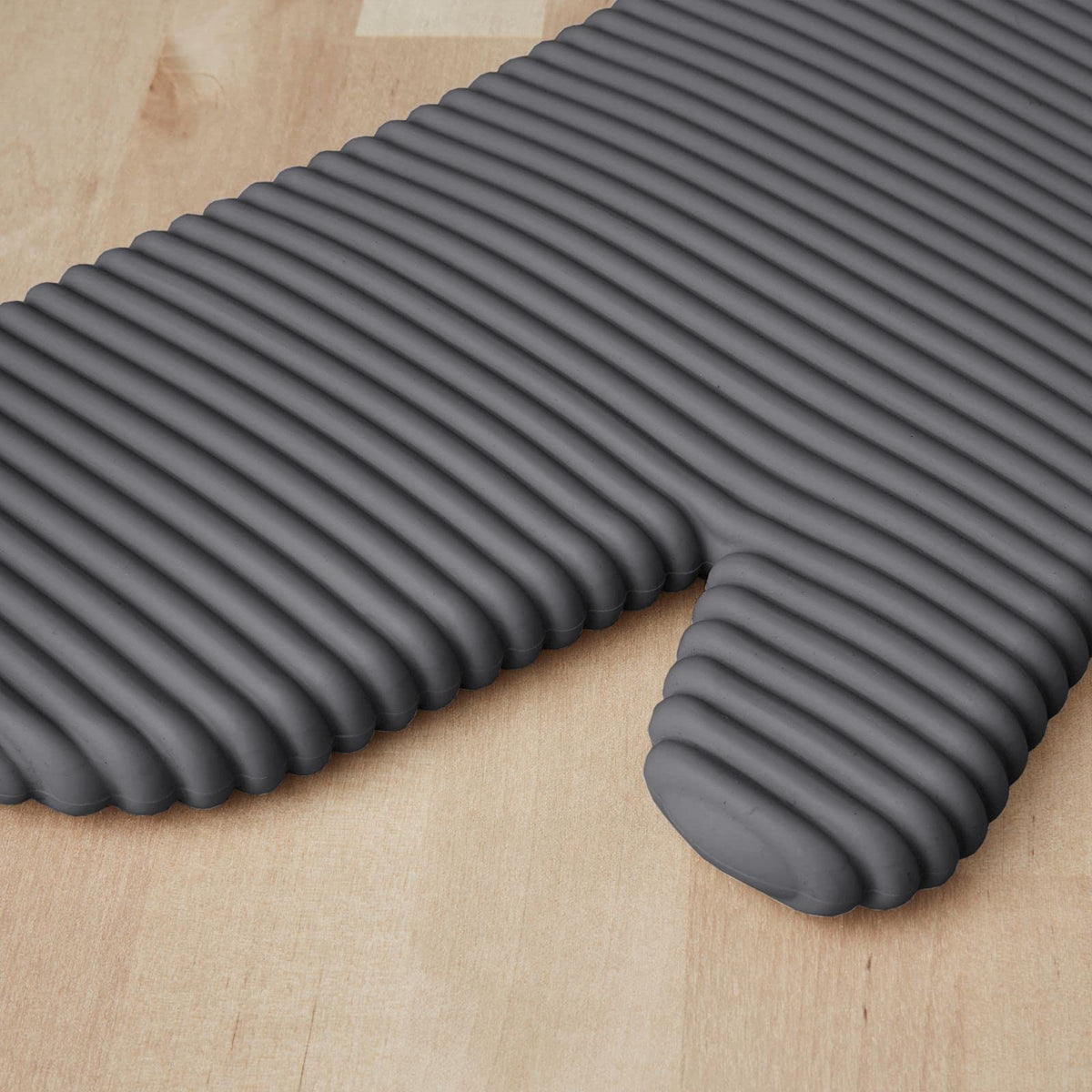 KitchenAid ribbed silicone oven mitt cuff detail highlighting cotton cuff and insulation