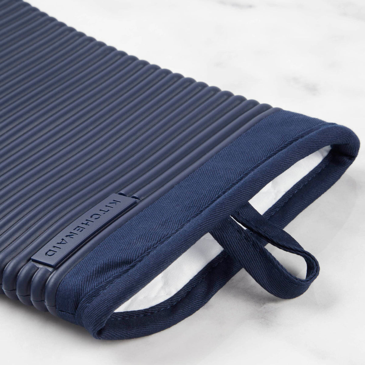 KitchenAid oven mitts are easy to rinse and wipe clean after cooking.