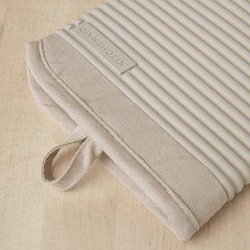 Close-up of ribbed texture and waterproof silicone mitt for safe handling.