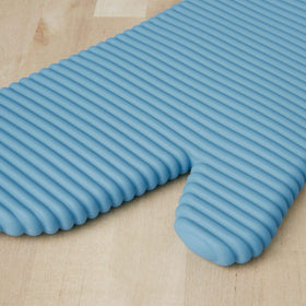 KitchenAid oven mitts with cotton cuff showing extra heat protection and insulation.
