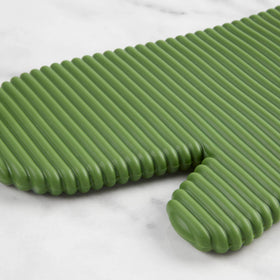 Two-piece set of KitchenAid oven mitts shown in Matcha color in a kitchen scene.