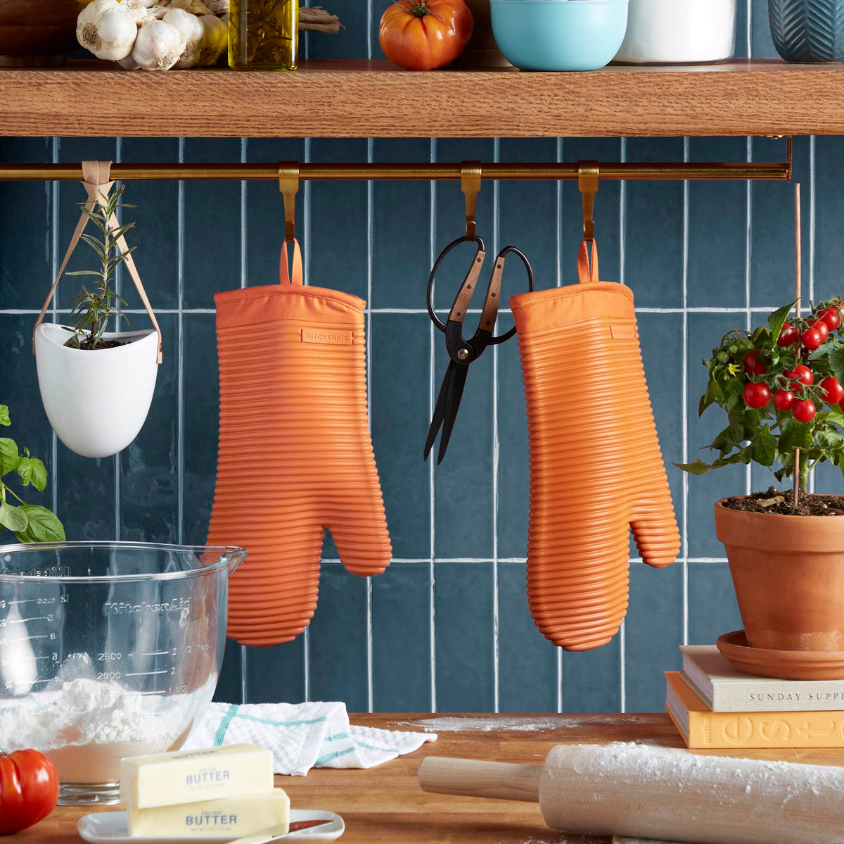 KitchenAid ribbed silicone mitts showing textured grip on hot pans