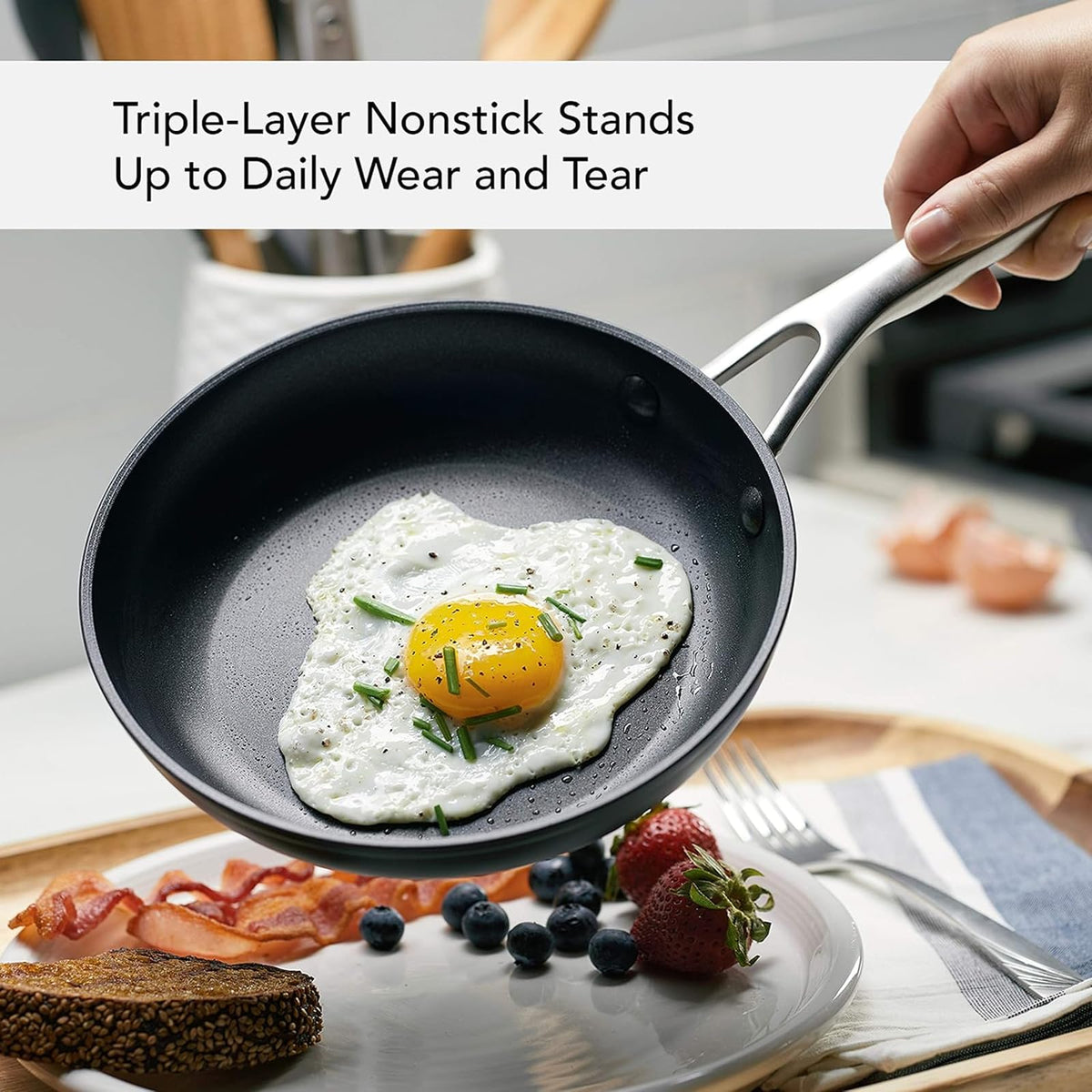 Riveted handles with nonstick interior on KitchenAid cookware.