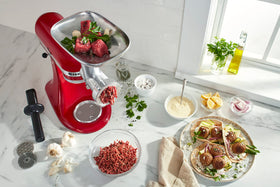 Two sausage stuffer tubes included for homemade sausages with KitchenAid grinder.