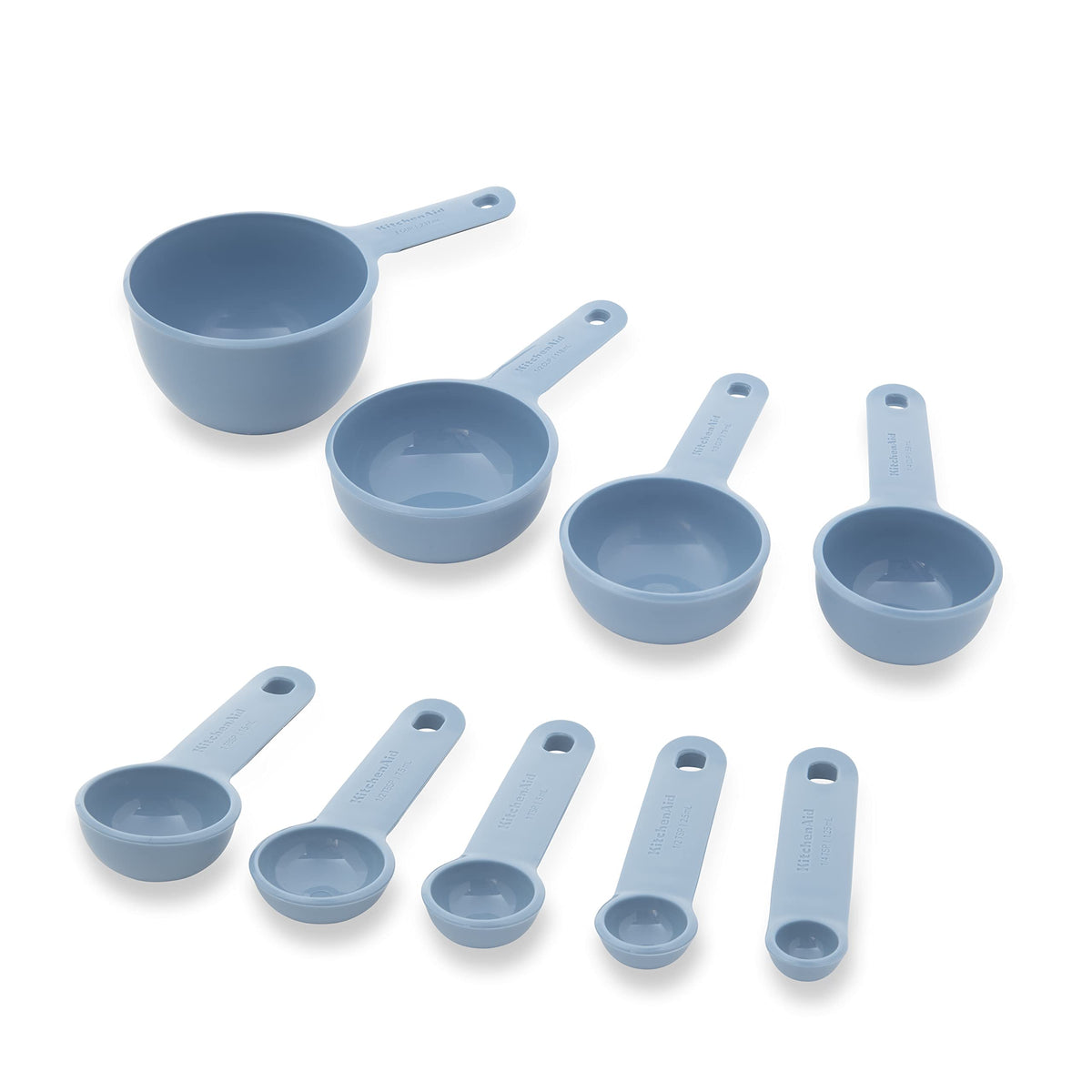 KitchenAid measuring set featuring soft-grip handles for comfortable measuring control.