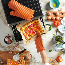 KitchenAid silicone mitts withstand heat up to 500°F during cooking tasks