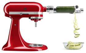 KitchenAid spiralizer attachment blades shown with storage case for versatile veggie prep.