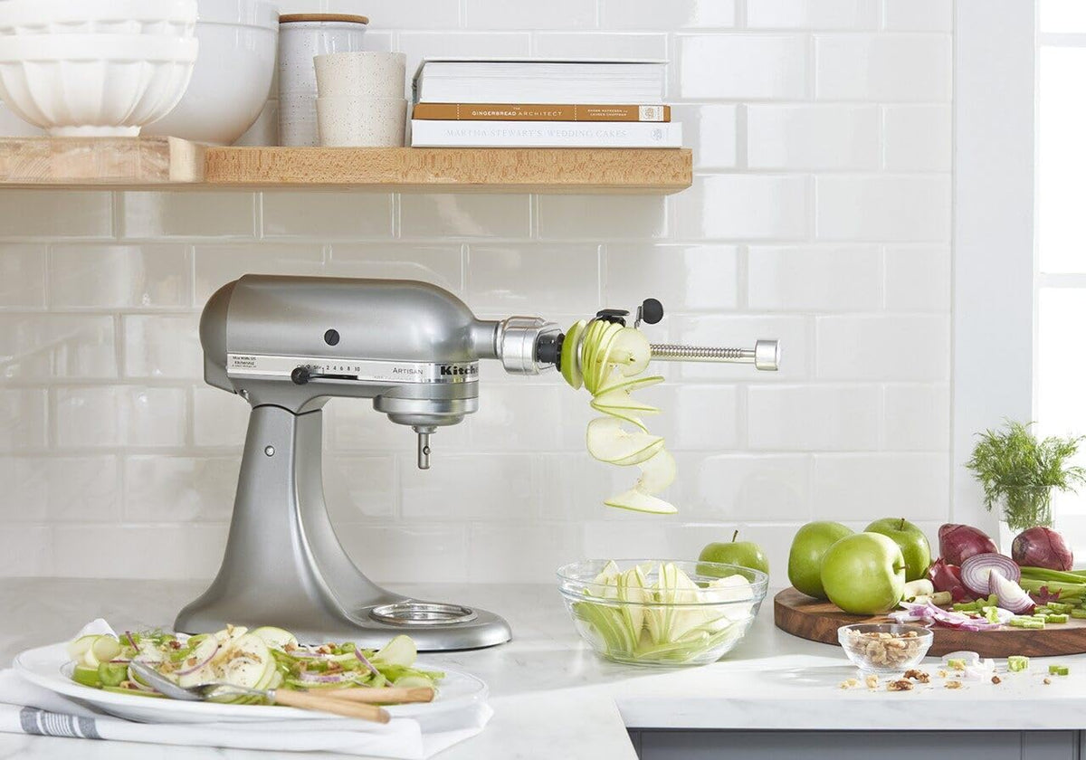KitchenAid spiralizer in use on zucchini to create veggie noodles.
