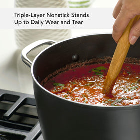 KitchenAid stockpot with reinforced handle rivets enhances durability and grip.
