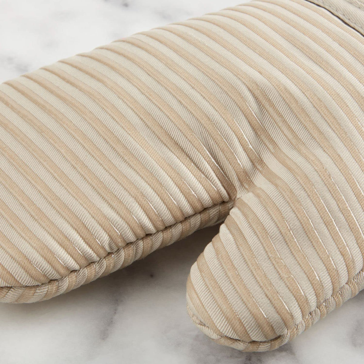 Textured terrycloth towels from KitchenAid absorb moisture for quick kitchen cleanup.
