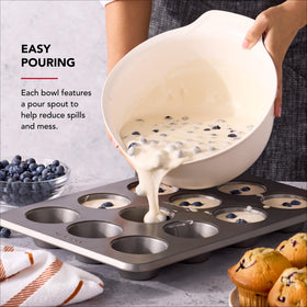 KitchenAid bowls with pour spout minimize spills during transfer.