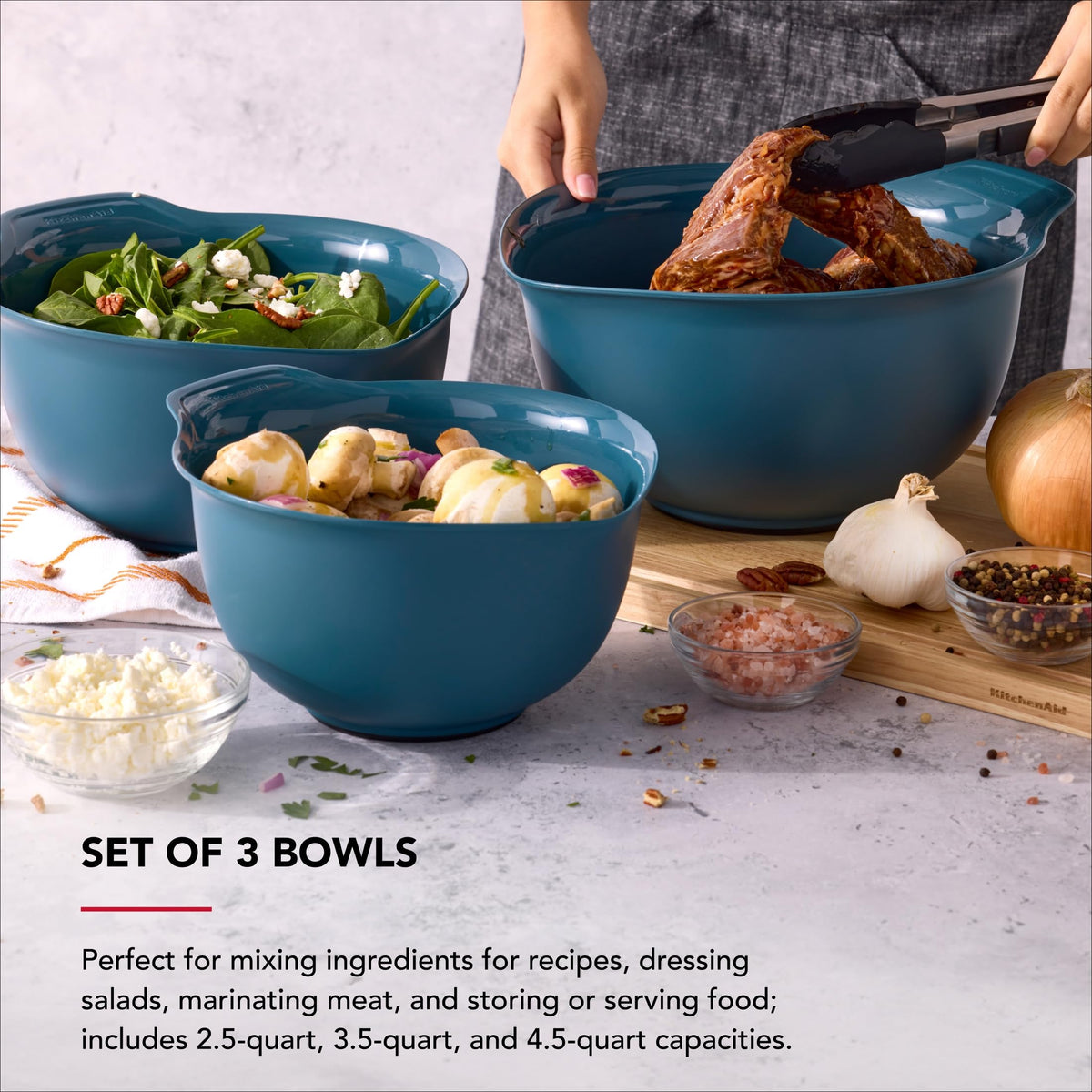 KitchenAid universal nesting bowls in use with large mixing tasks.
