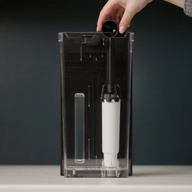 KitchenAid water filter installed in espresso machine for better taste and easier maintenance.