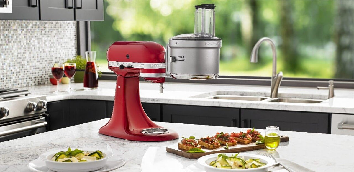 KitchenAid wide feed tube accepts larger ingredients, reducing prep steps.