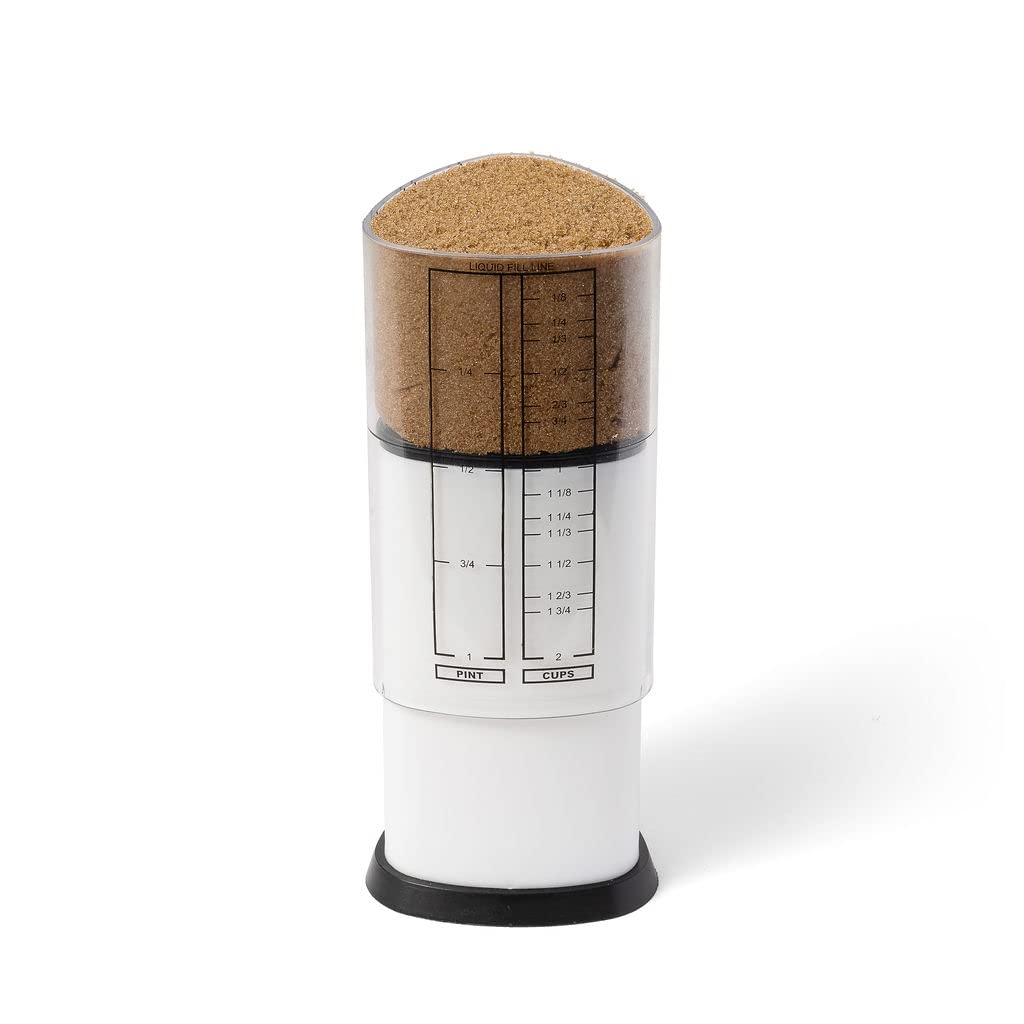 KitchenArt 2-Cup Tri Adjust-A-Cup pour in action for precise liquid measurements.