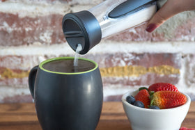Top-shake pour action for versatile dispensing of sugar or spices.