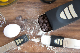 KitchenArt Baker’s Pro Adjust-A-Measure Half-Cup Scoop highlights compact, adjustable portion control.