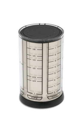 KitchenArt Pro adjustable cup with metric and standard measurements for liquids and dry ingredients.