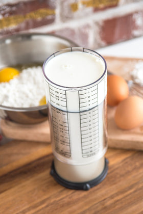 KitchenArt Adjust-A-Cup shows measurement marks for quick conversions.