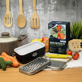 KitchenBe1 stainless-steel grating blades offer large and small shreds for versatile prep.