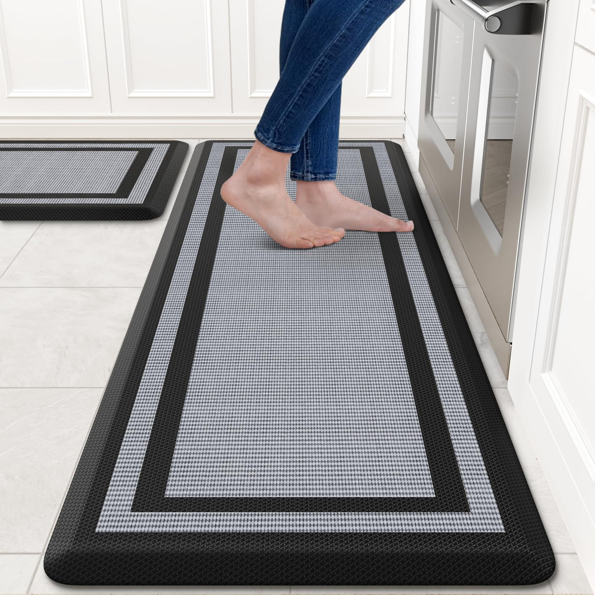 KitchenClouds anti-fatigue mats set of two laid flat in a bright kitchen for standing comfort