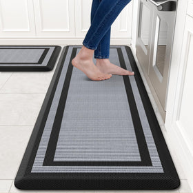 KitchenClouds anti-fatigue mats set of two laid flat in a bright kitchen for standing comfort