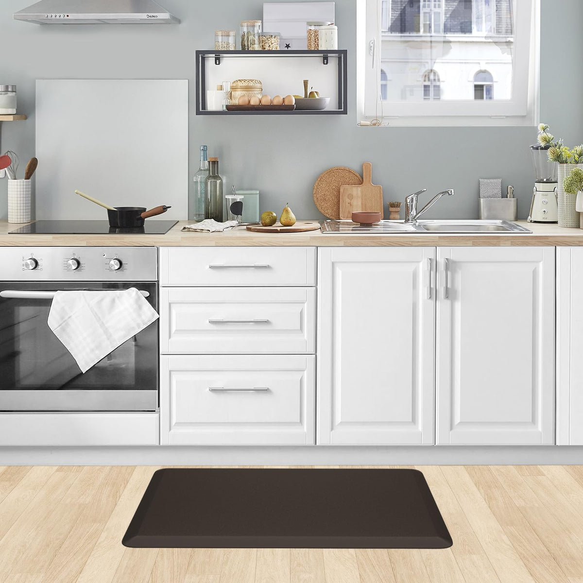KitchenClouds kitchen mat easy-to-clean surface keeps dirt off floors.