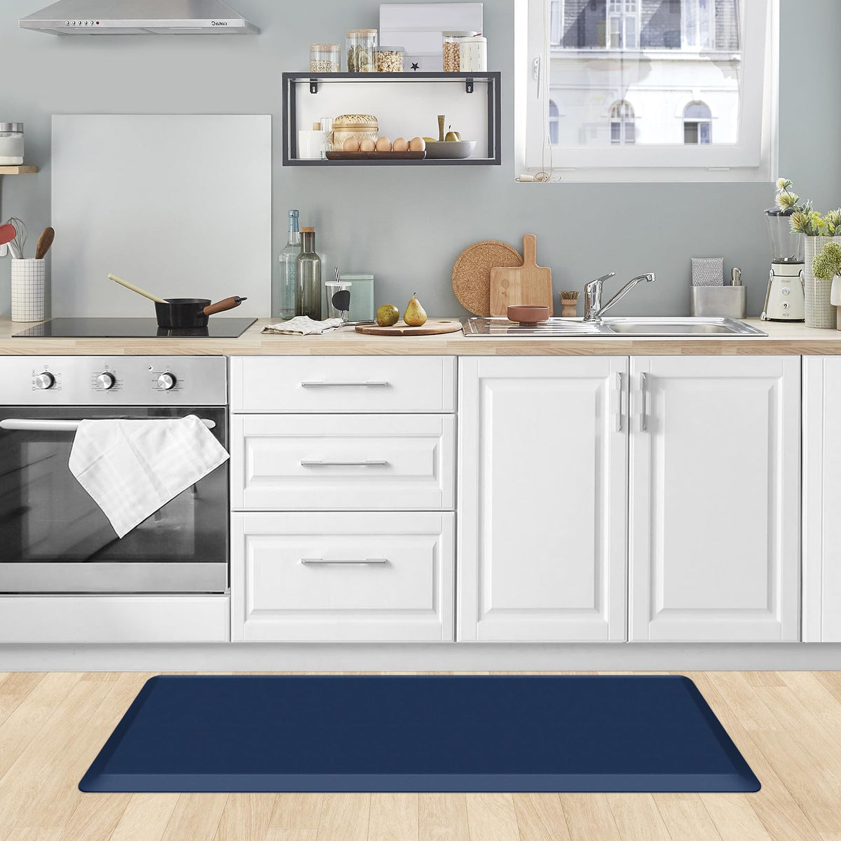 KitchenClouds blue mat folds flat for quick storage and setup.