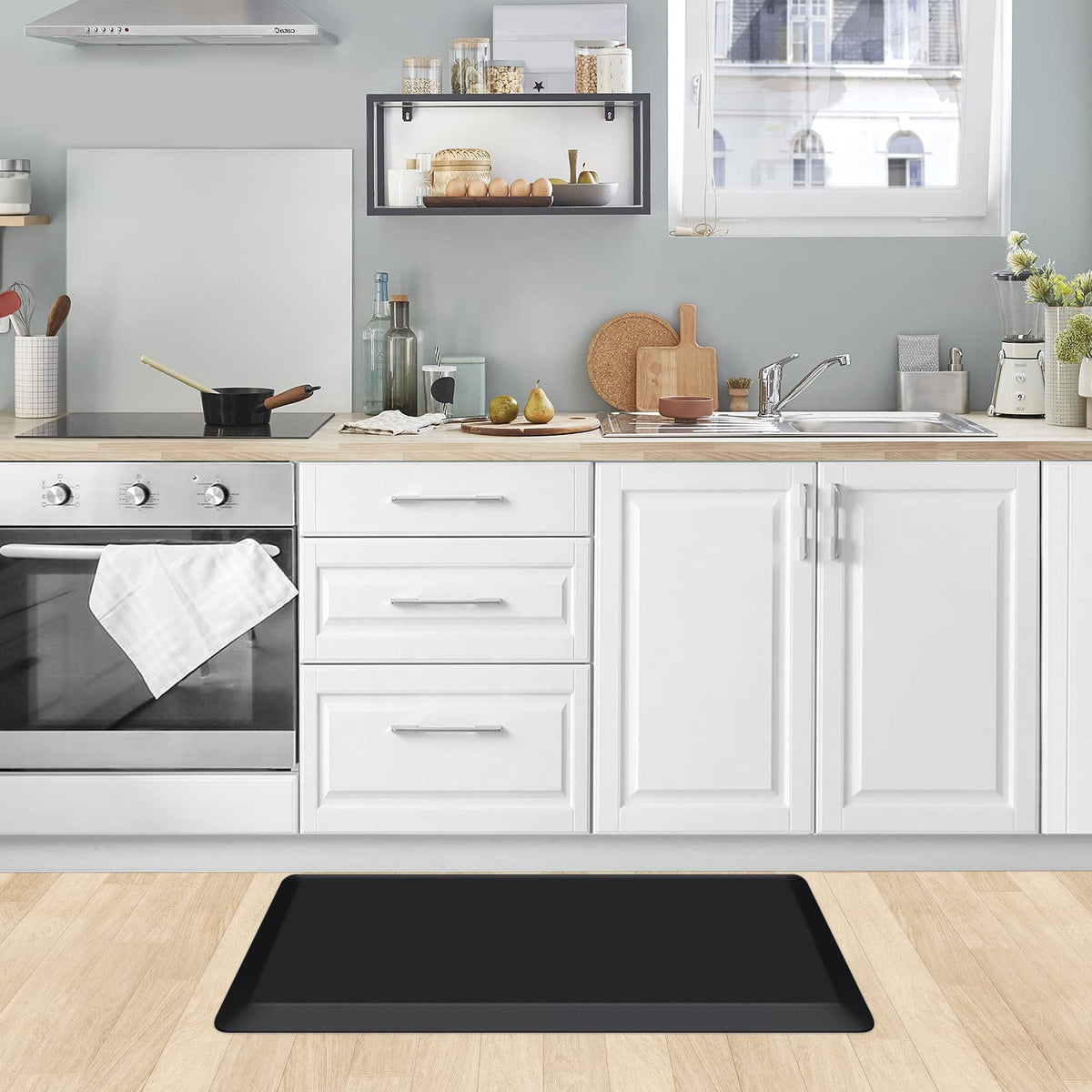 KitchenClouds Kitchen Mat placed by the sink for standing comfort.
