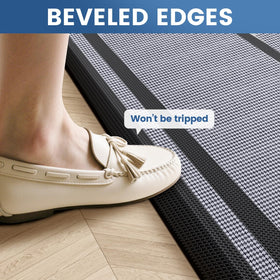 KitchenClouds mat by the sink illustrating water resistant surface during cleanup