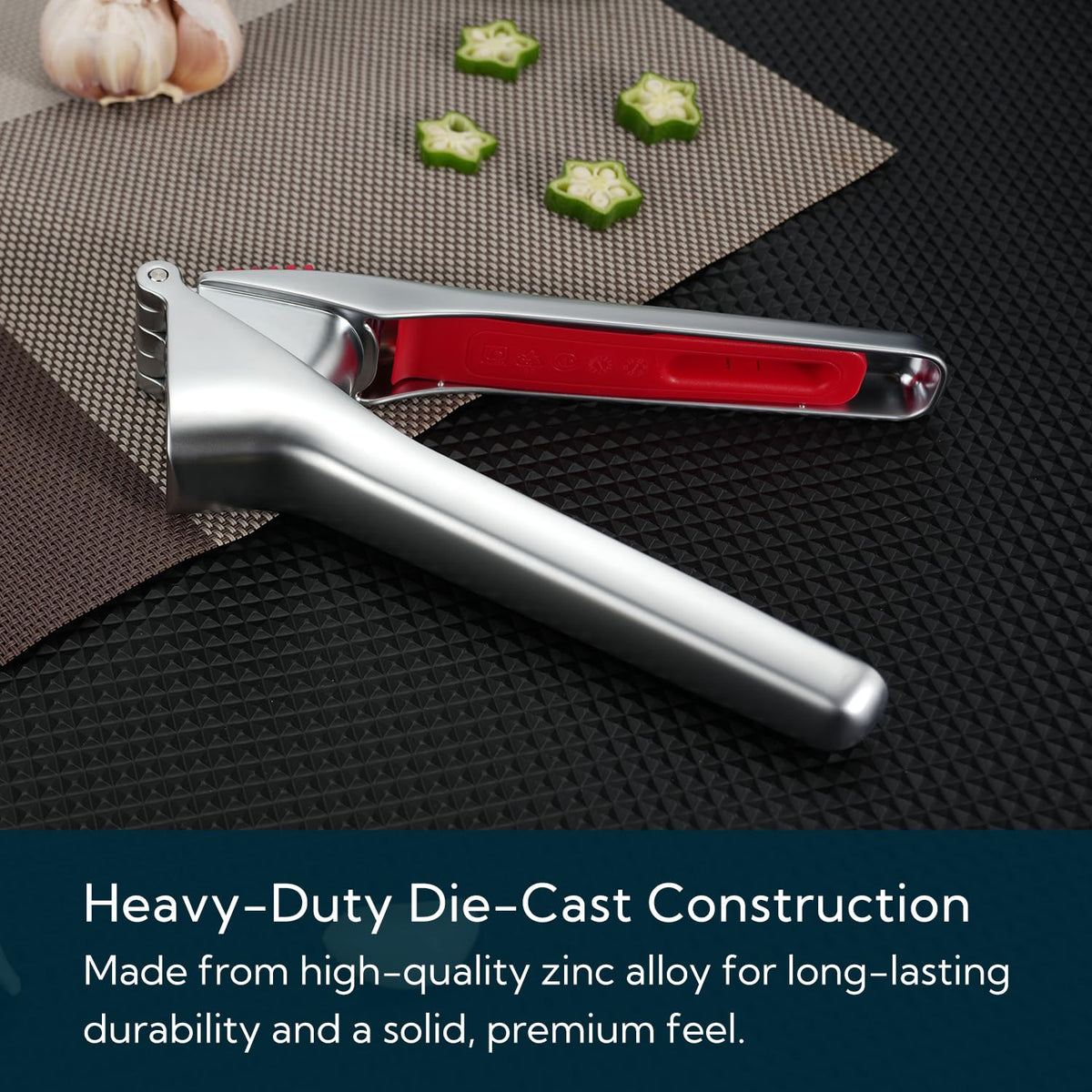 KITCHENDAO garlic press with extended handles for effortless crushing.
