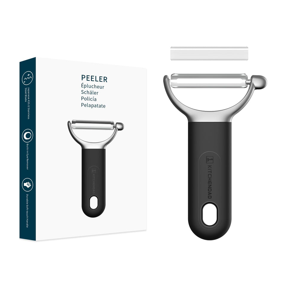 KITCHENDAO swivel peeler blade close-up showing sharp Japanese edge for precise peeling.
