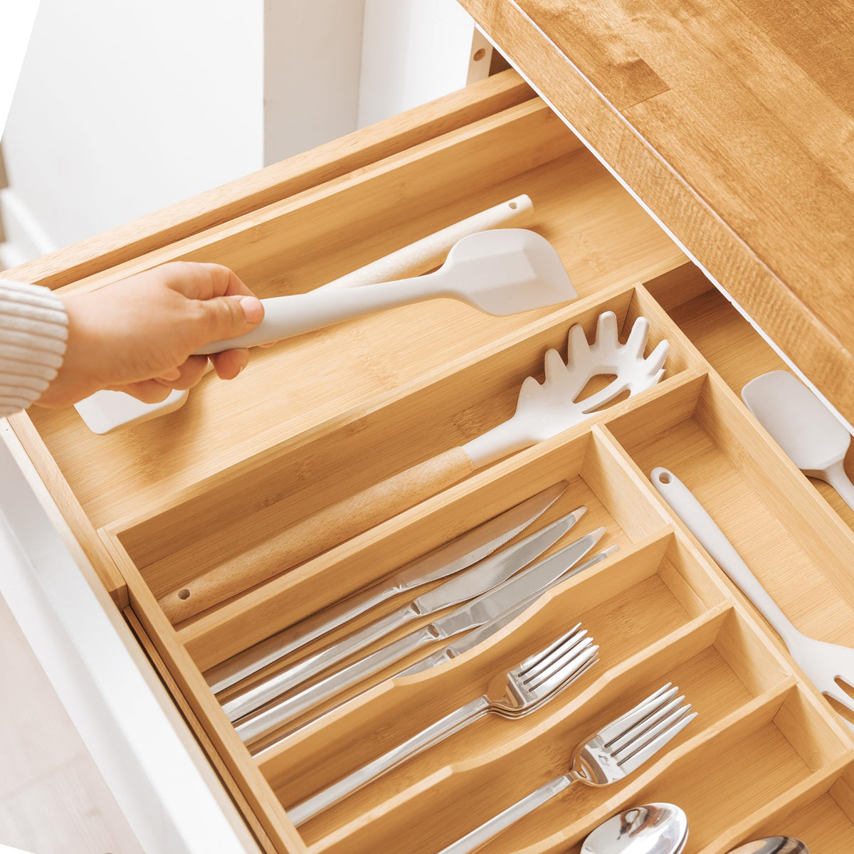 Capacity for up to 12 full flatware sets with KitchenEdge organizer.