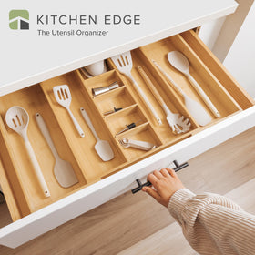KitchenEdge adjustable drawer organizer fully expanded wide maximizes drawer capacity.