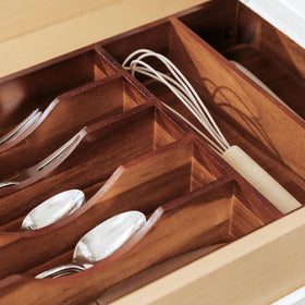 Efficient drawer organization helps streamline meal prep and cleanup.