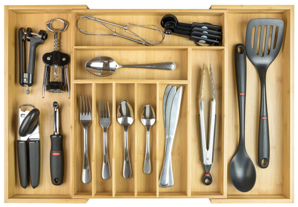 KitchenEdge Premium Bamboo Silverware Organizer in a drawer, neatly separating forks, knives, and spoons.