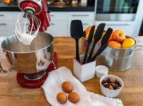 KITCHENLOVE silicone spatula with red and black handles for comfortable cooking.