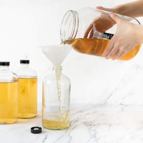 Kitchentoolz cookie jar with lid keeps treats fresh.